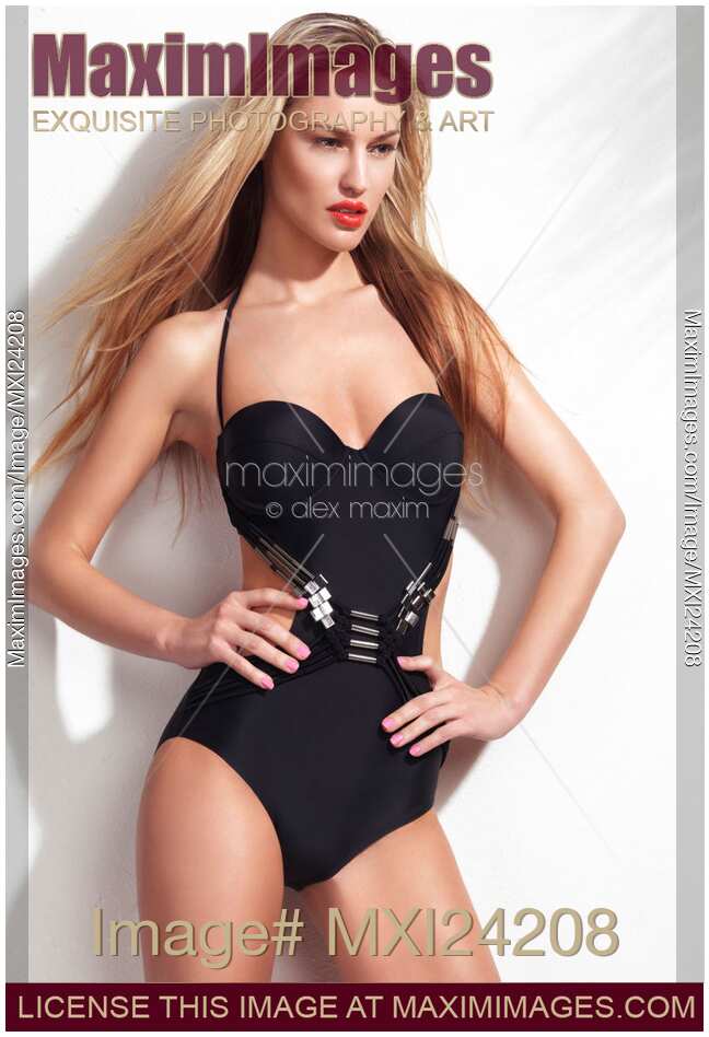 Beautiful woman wearing a trendy one-piece swimsuit