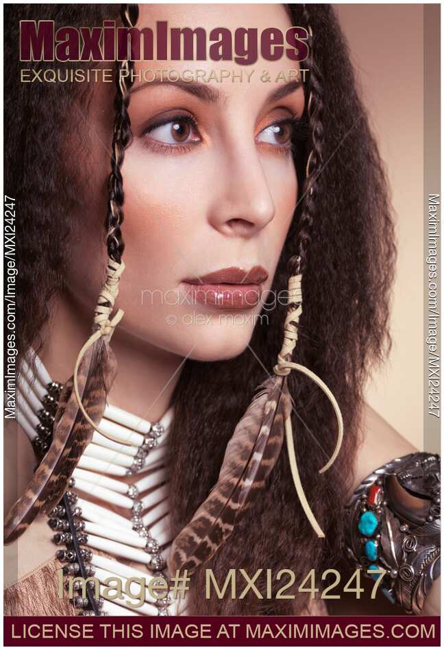 Beautiful woman wearing aboriginal accessories and jewelry