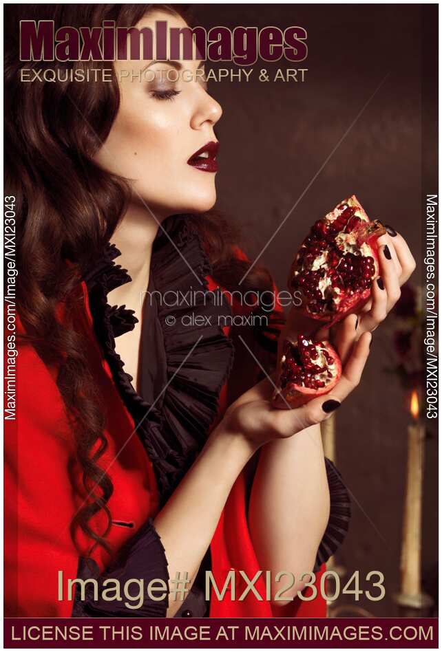 Beautiful Woman with a Pomegranate
