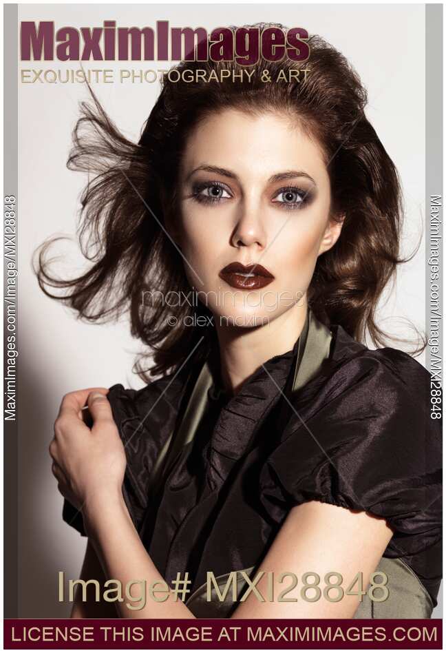 Beautiful woman with dramatic makeup expressive portrait