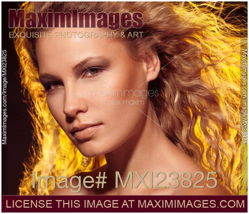 Beautiful Woman with Flying Golden Hair