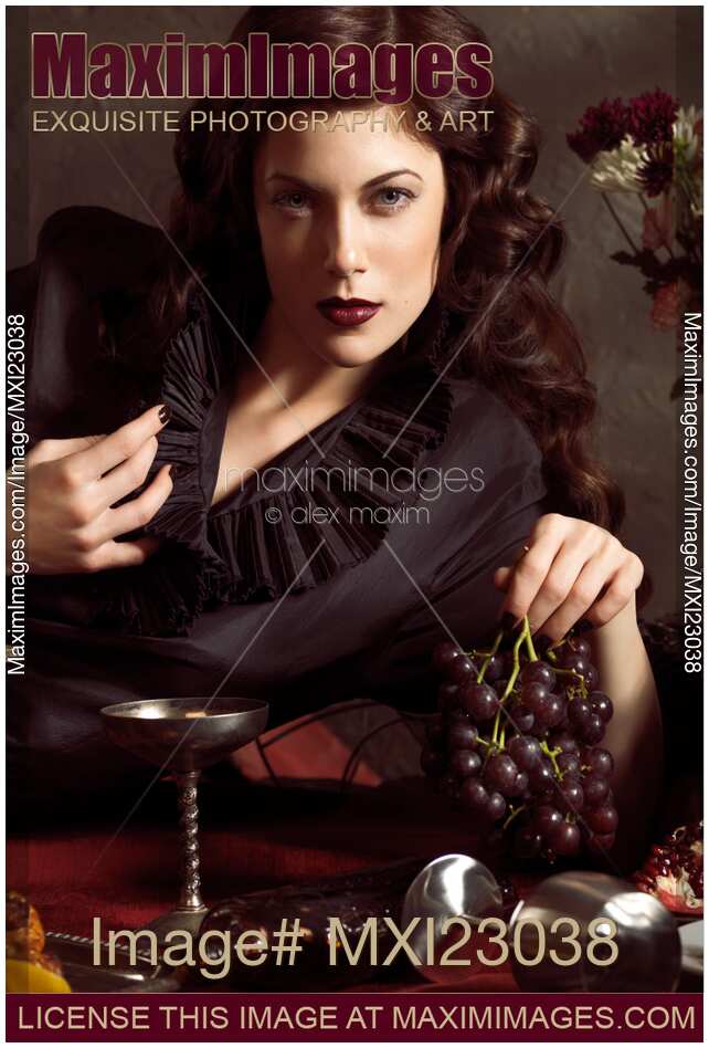 Beautiful Woman with Grapes