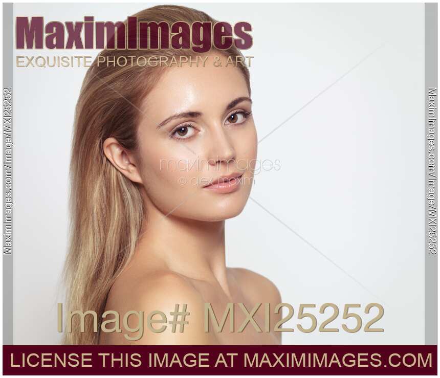 Beautiful woman with long light brown hair and clean look