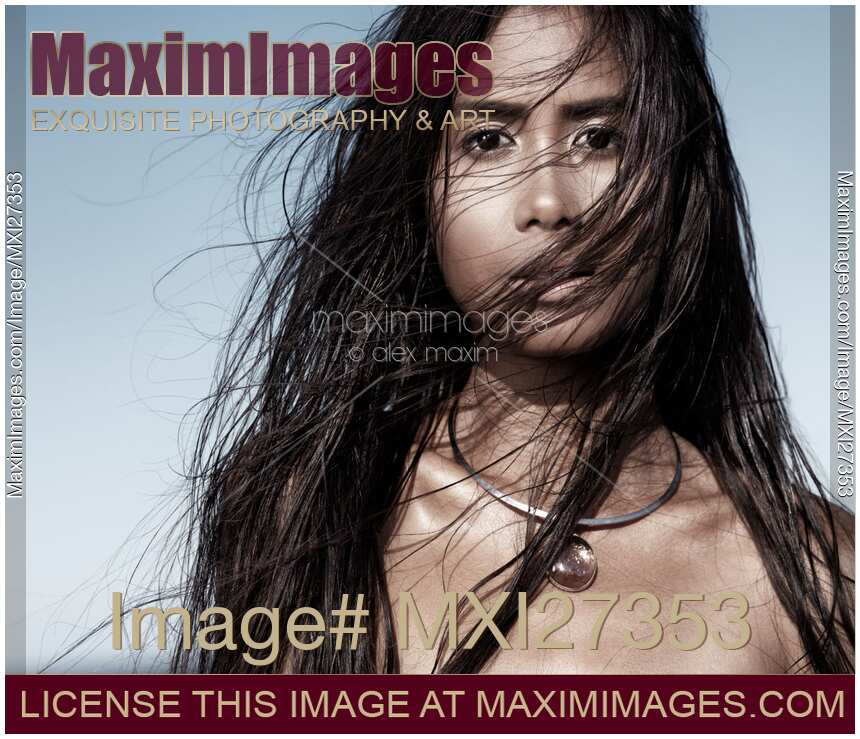 Beautiful woman with long wet hair artistic portrait