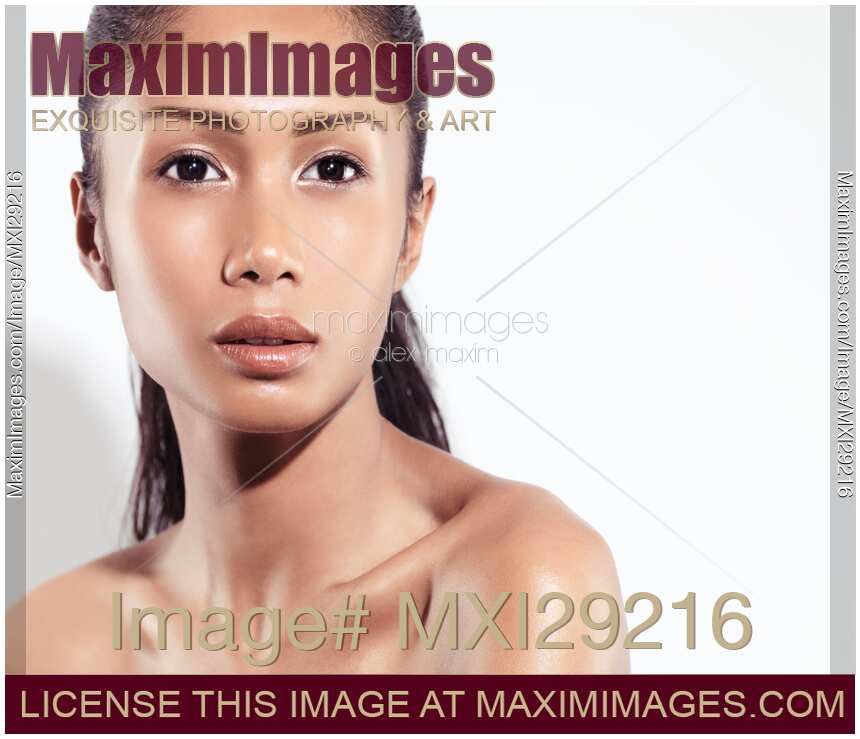 Beautiful young woman closeup exotic asian face beauty portrait