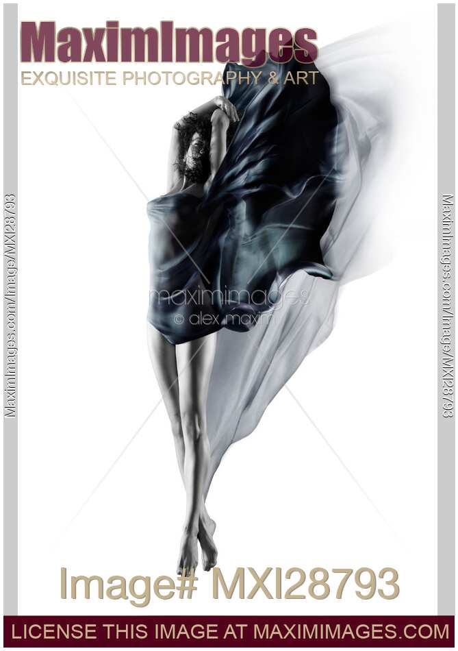 Beautiful young woman dancing in mid-air with flowing dark blue cloth around her naked body