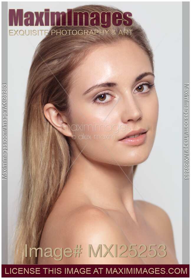 Beautiful young woman face with natural look