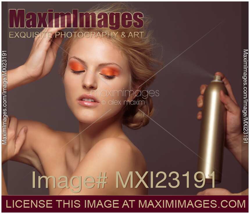 Beautiful Young Woman Having Her Hair Styled