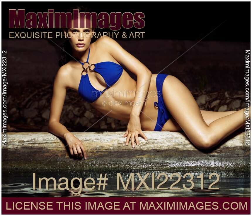 Beautiful Young Woman in Blue Bikini