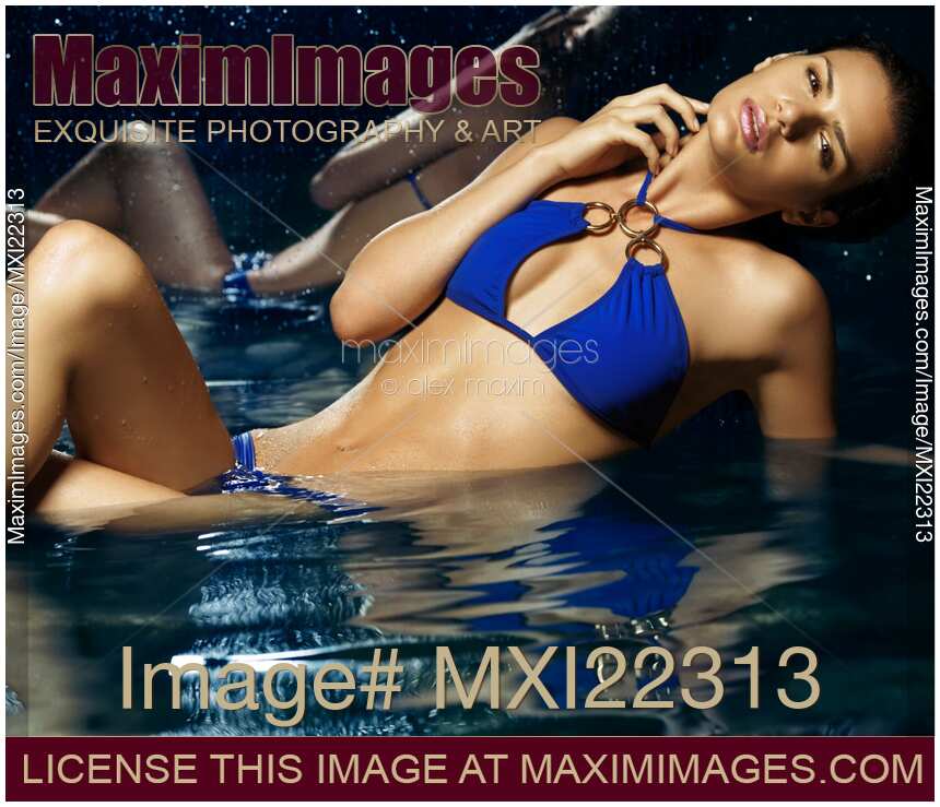 Beautiful Young Woman in Blue Bikini