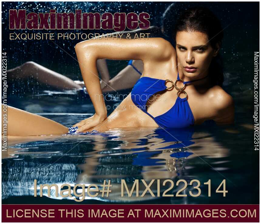 Beautiful Young Woman in Blue Bikini