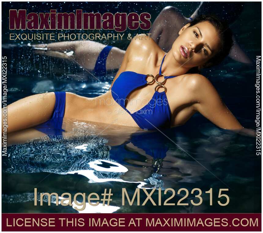 Beautiful Young Woman in Blue Bikini