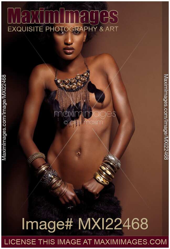 Beautiful Young Woman on Brown Background