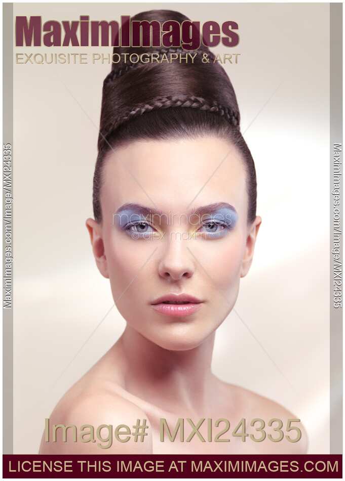 Beautiful Young Woman Portrait with Creative Hairstyle