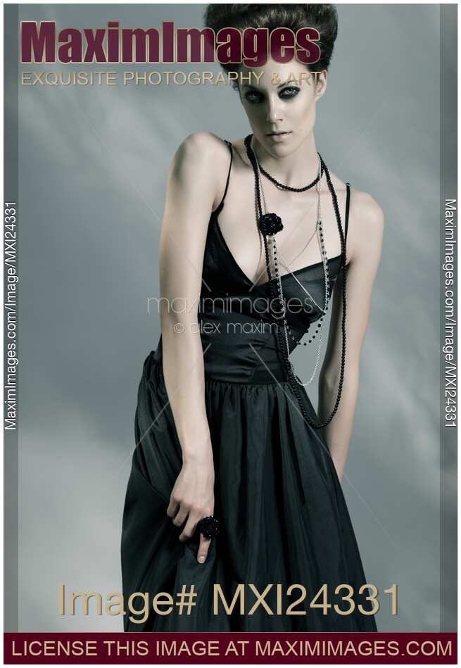 Beautiful Young Woman Wearing Black Dress