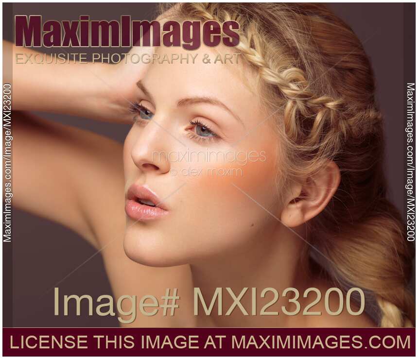 Beautiful Young Woman with Braided Hair