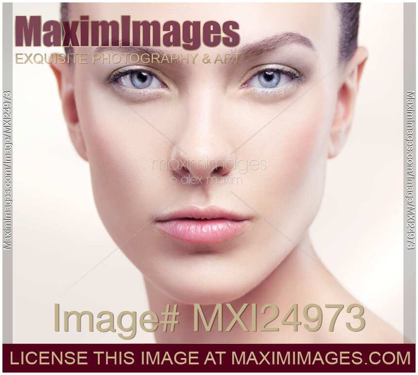 Beautiful young woman with clean skin closeup