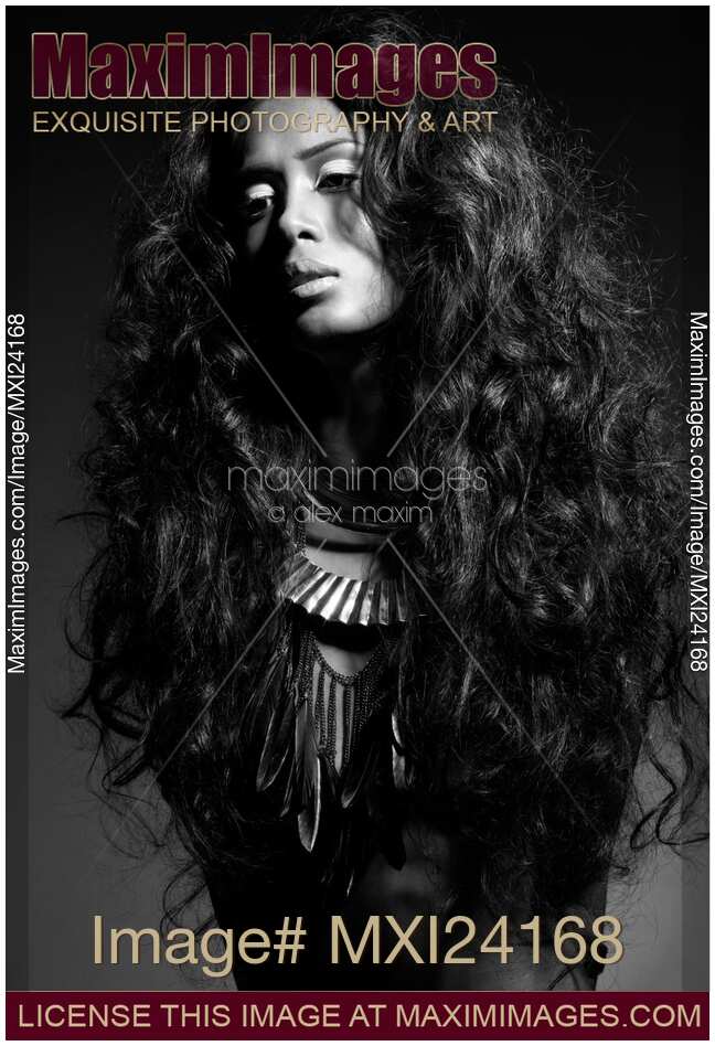 Beautiful young woman with long brown hair black and white