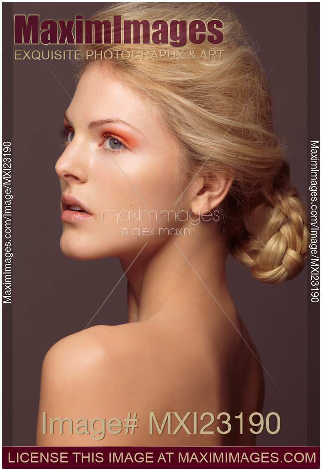 Beautiful Young Woman with Orange Eyeshadow