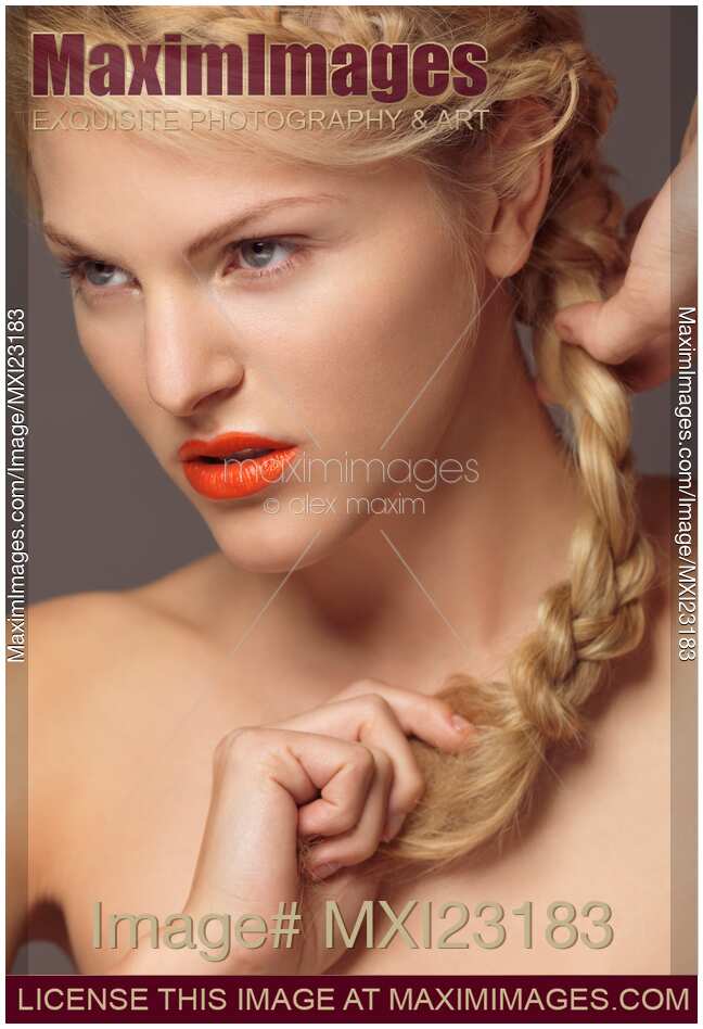 Beautiful Young Woman with Orange Lipstick