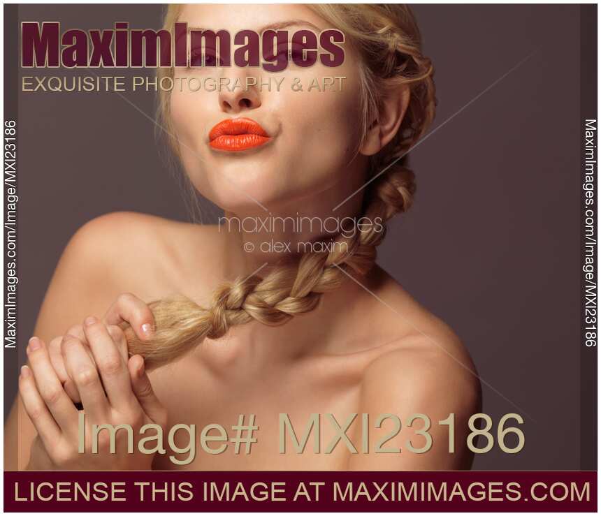 Beautiful Young Woman with Orange Lipstick