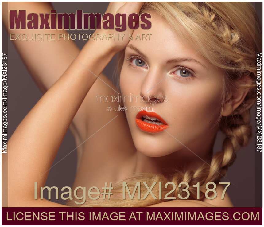 Beautiful Young Woman with Orange Lipstick