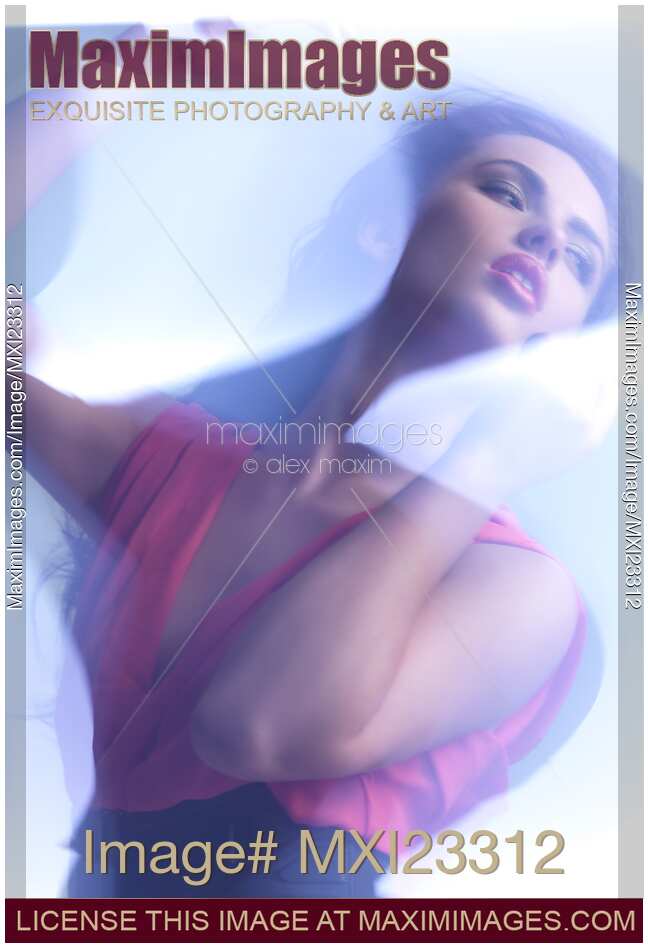 Beauty Photo of a Woman in Shining Blue Settings