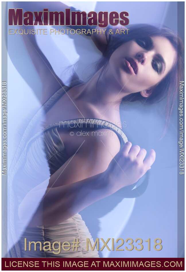 Beauty Photo of a Woman in Shining Blue Settings