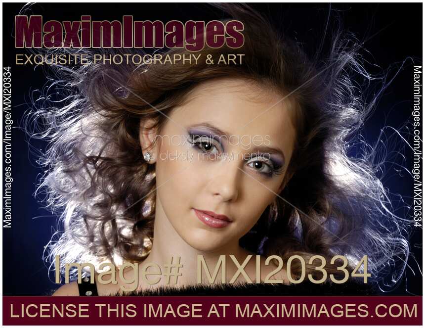 Beauty portrait of a girl with flying hair