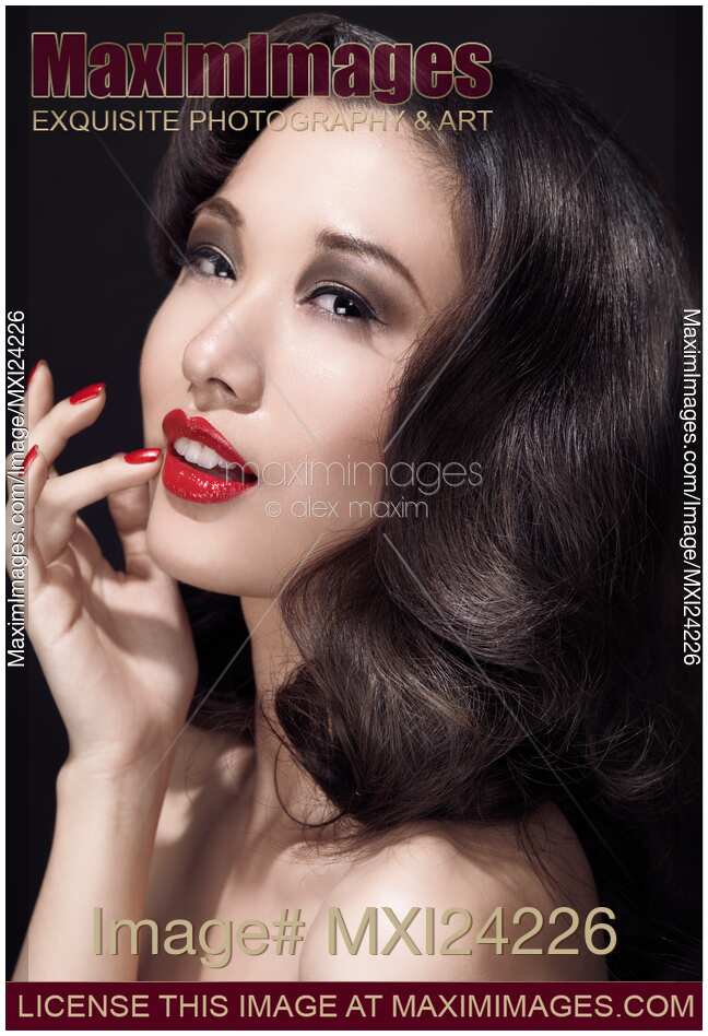 Beauty portrait of a woman with red lipstick