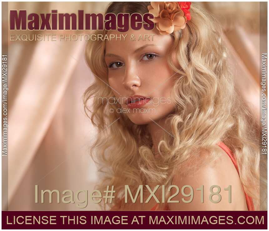 Beauty Portrait of a Young Woman with Beautiful Blond Hair