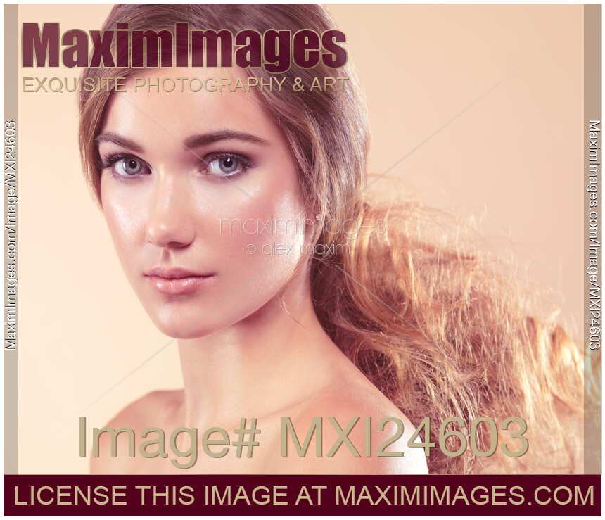 Beauty portrait of a young woman with soft natural look