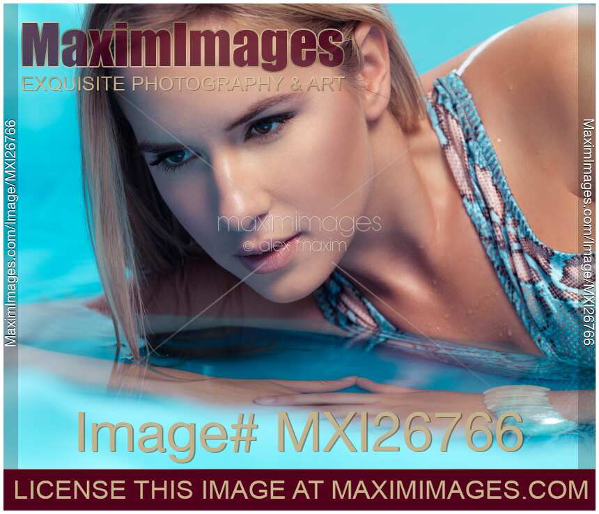 Beauty portrait of woman in water