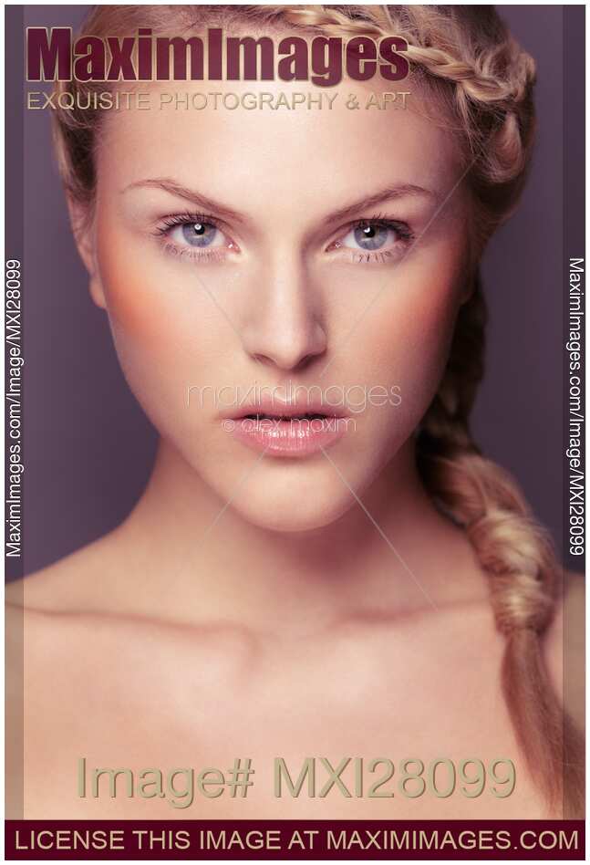 Beauty portrait of woman with blond braided hair and gray eyes