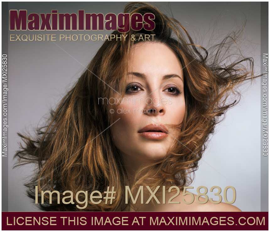 Beauty portrait of woman with flying hair