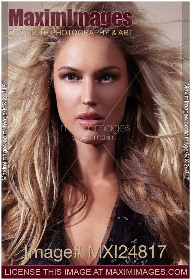 Beauty portrait of woman with long blond hair
