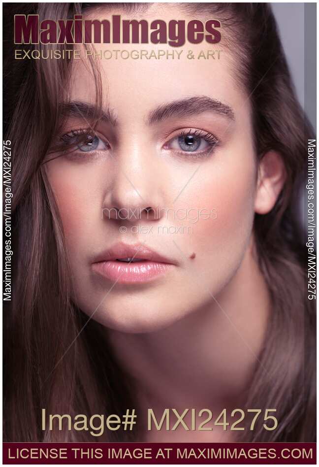 Beauty portrait of young woman with soft natural look