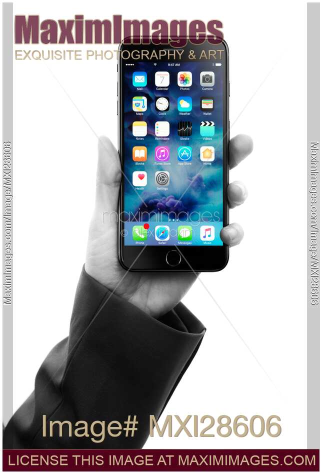 Black and white hand holding Apple iPhone 7