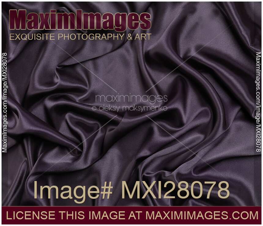 Black shiny silky fabric background