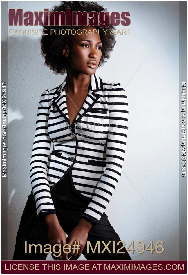 Black woman in fashionable clothes
