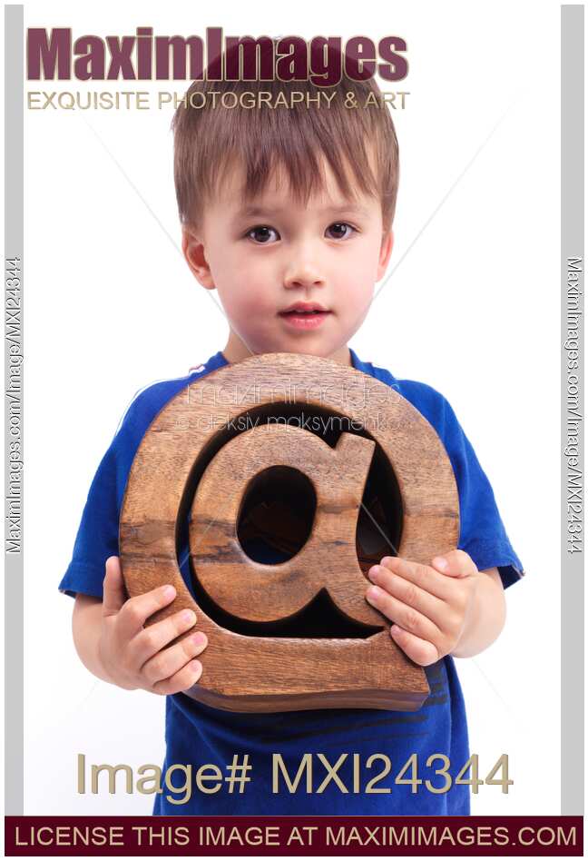 Boy holding email symbol at in his hands