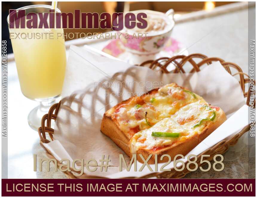 Breakfast pizza bread and drinks