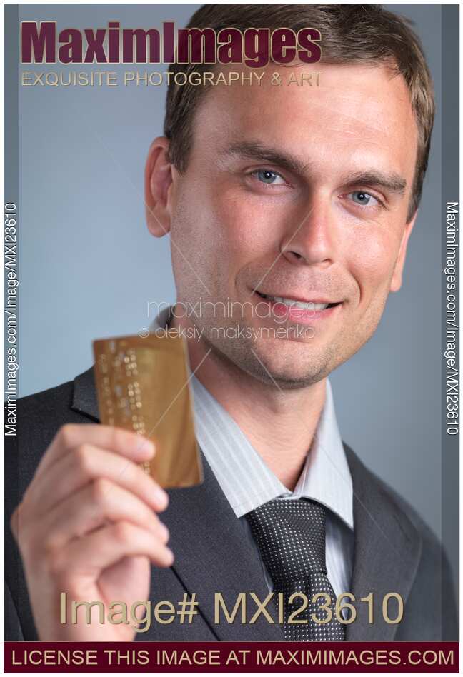 Businessmen Holding a Credit Card