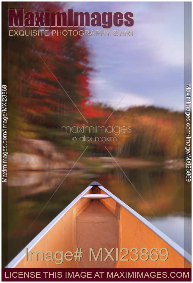 Canoe on a Lake in Autumn