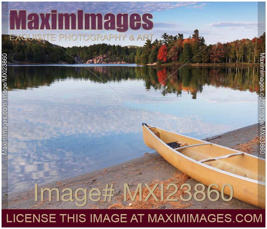 Memo dø pensum Photo of Canoe on a Shore Autumn Nature Scenery | Stock Image MXI23860