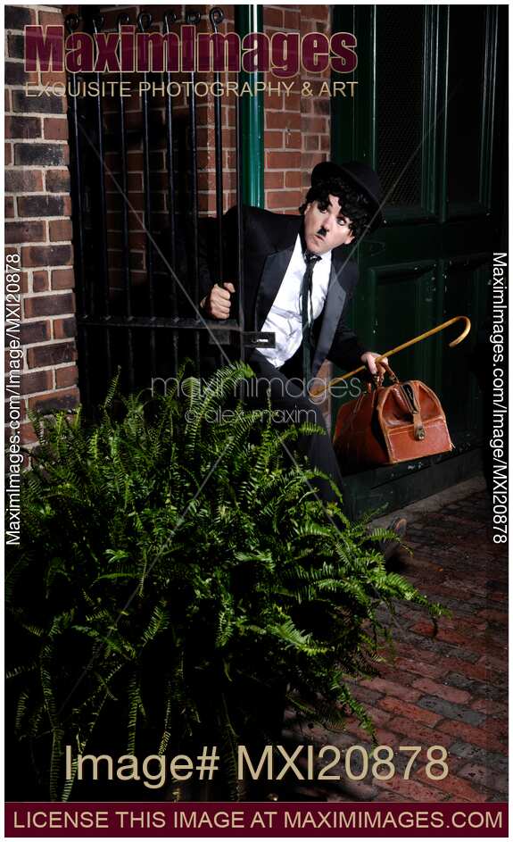 Charlie Chaplin Running Away