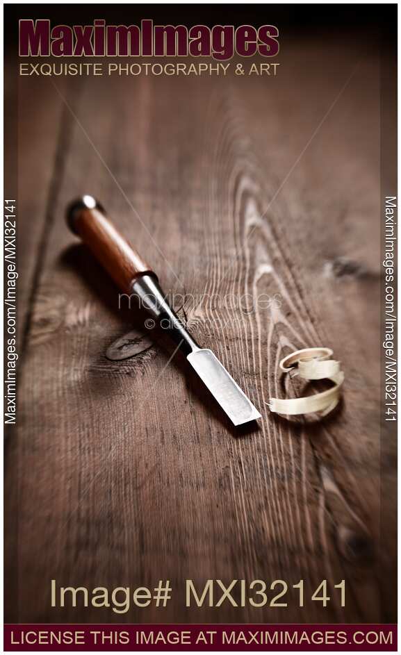 Chisel and wood shavings Carpentry still life