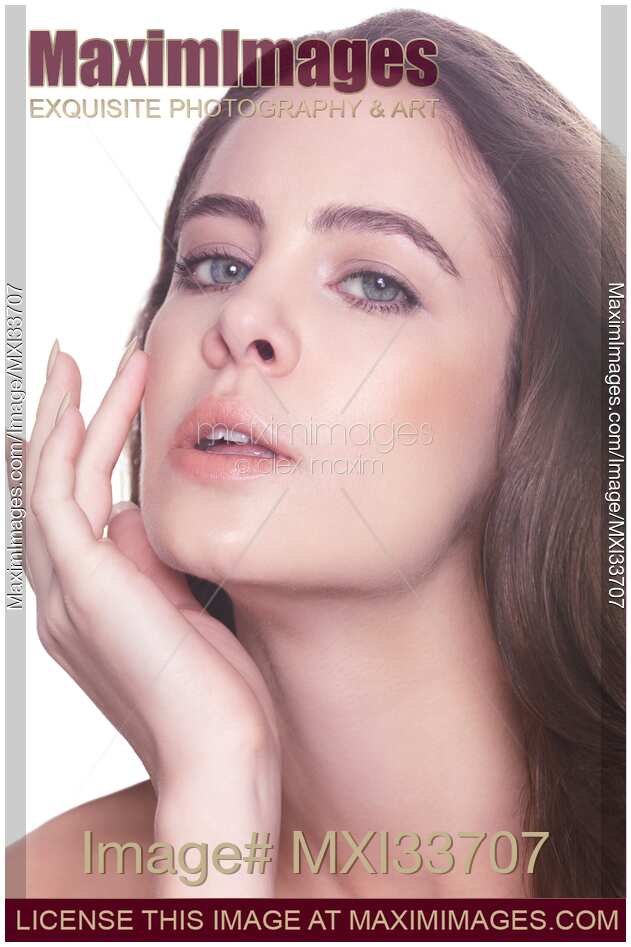 Closeup beauty portrait of young woman face with a relaxed sensual expression