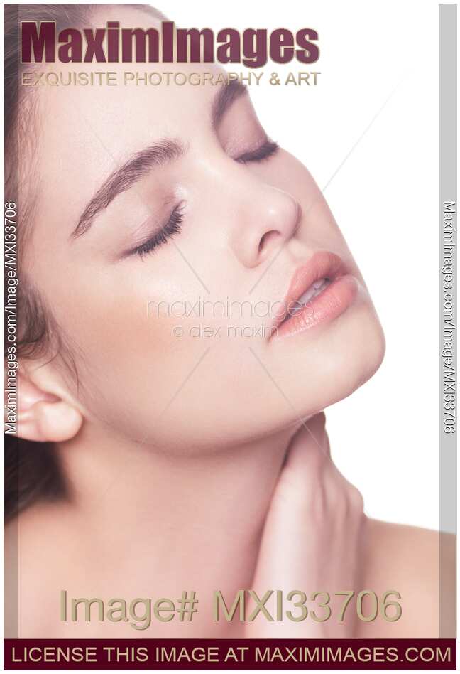 Closeup beauty portrait of young woman face with natural makeup, closed eyes and relaxed expression