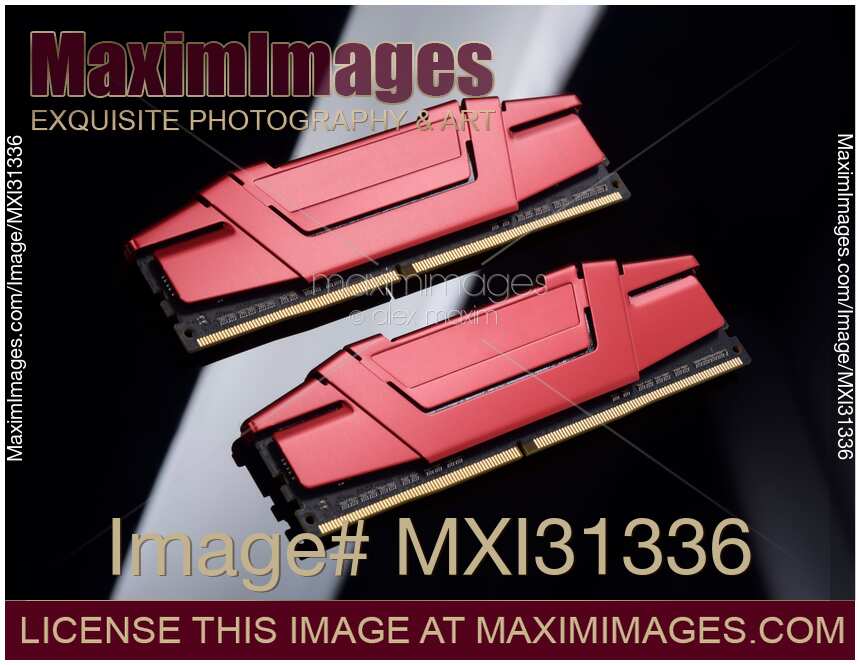 Closeup DDR4 dual-channel computer memory with red heat sinks on black